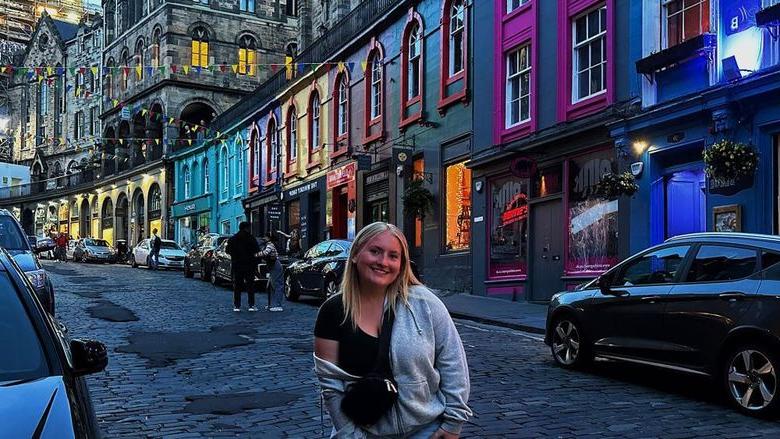 Student on a main street in Scotland